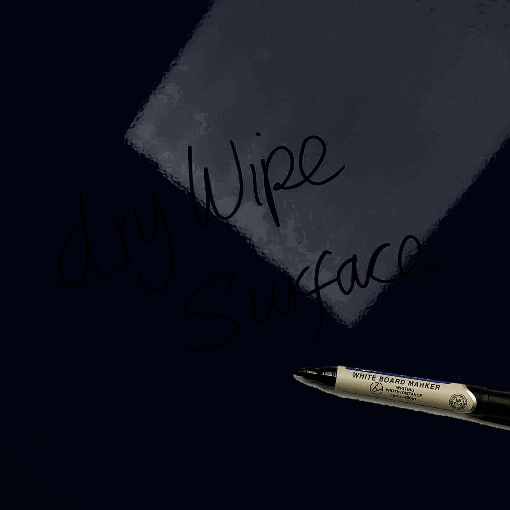 The words dry wipe surface written in marker pen on the Wolves Under The Moon magnetic notice board