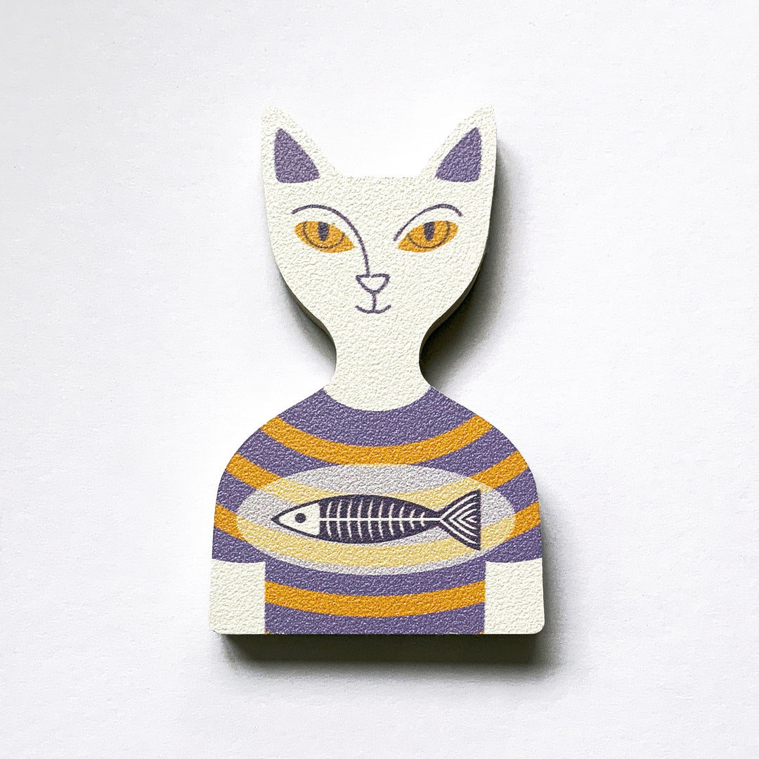 A white cat in a purple and yellow striped t-shirt design plywood fridge magnet by Beyond the Fridge