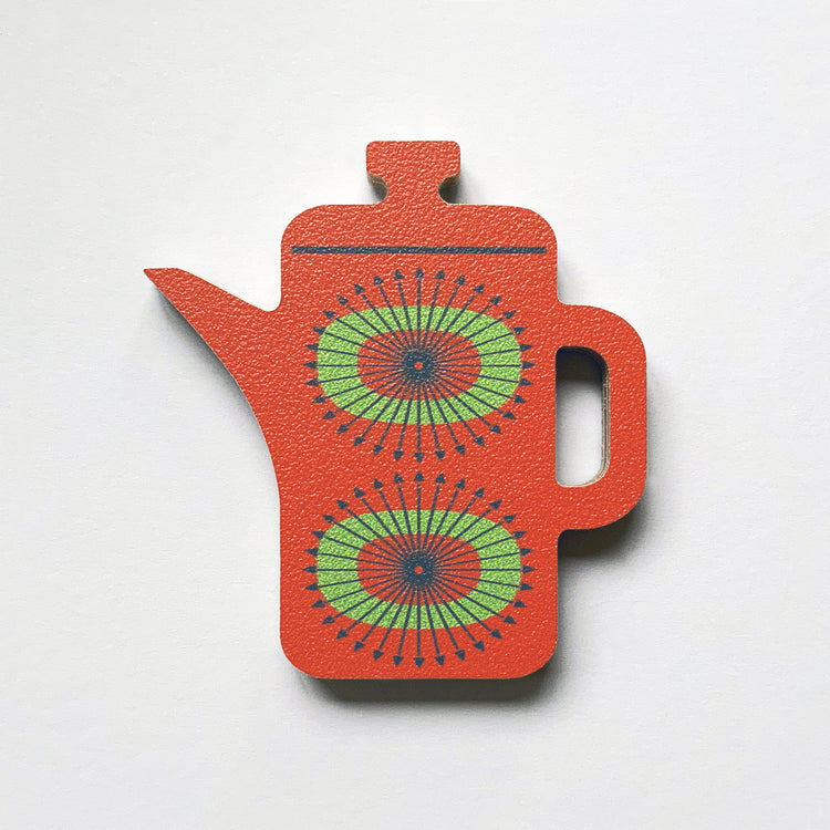 An orange coffee pot shaped plywood fridge magnet by Beyond the Fridge