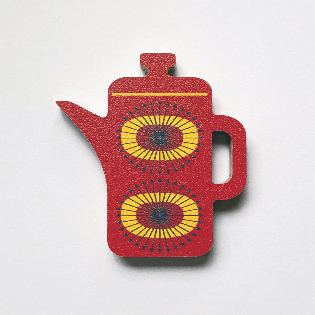 A red coffee pot shaped plywood fridge magnet by Beyond the Fridge