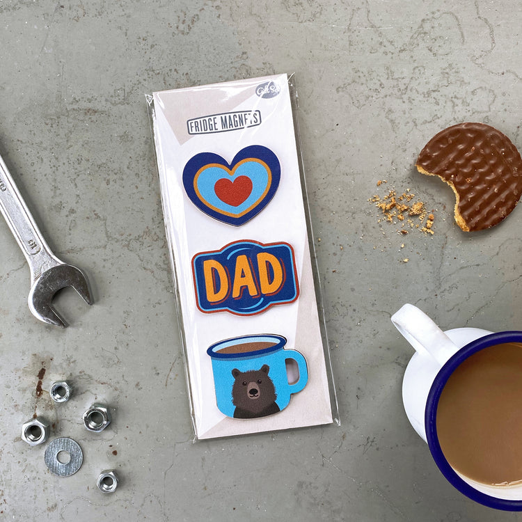 A table top with Father's Day gift set of three fridge magnets by Beyond the Fridge