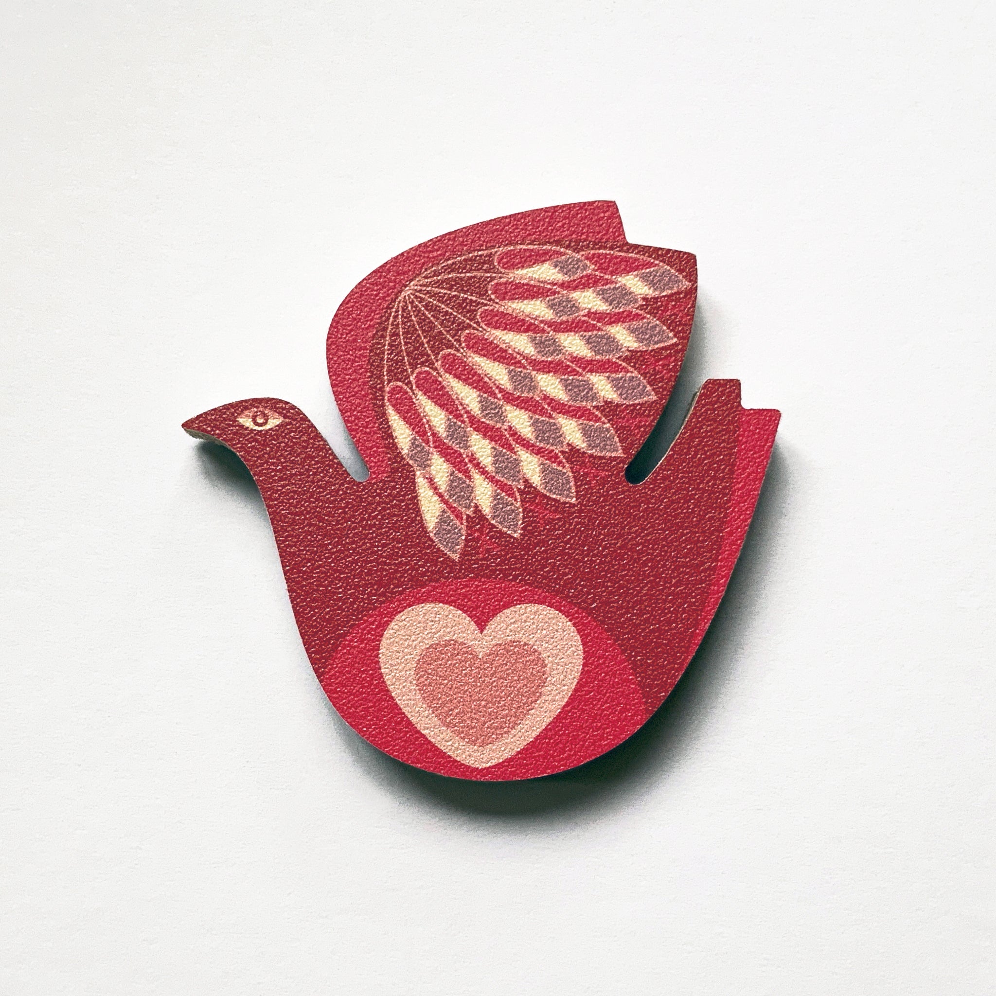 A lovebird shaped plywood fridge magnet by Beyond the Fridge