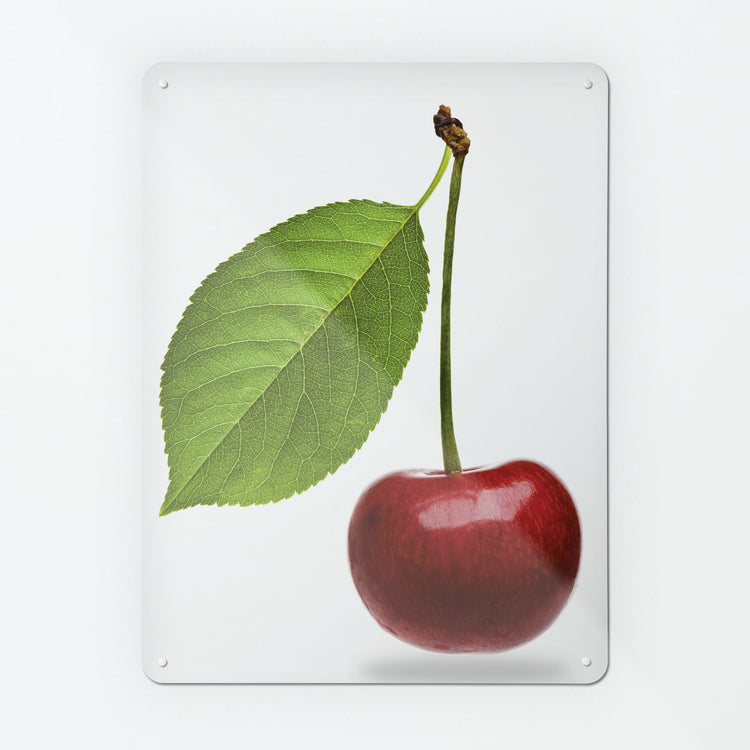 A large magnetic notice board by Beyond the Fridge with a photograph of a cherry and leaf on a white background