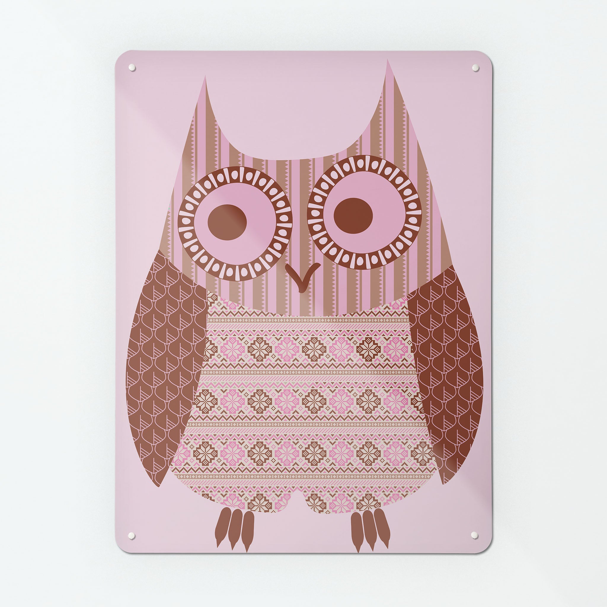 The corner detail of a Fair Isle Owl pink and brown magnetic board to show it’s high gloss surface