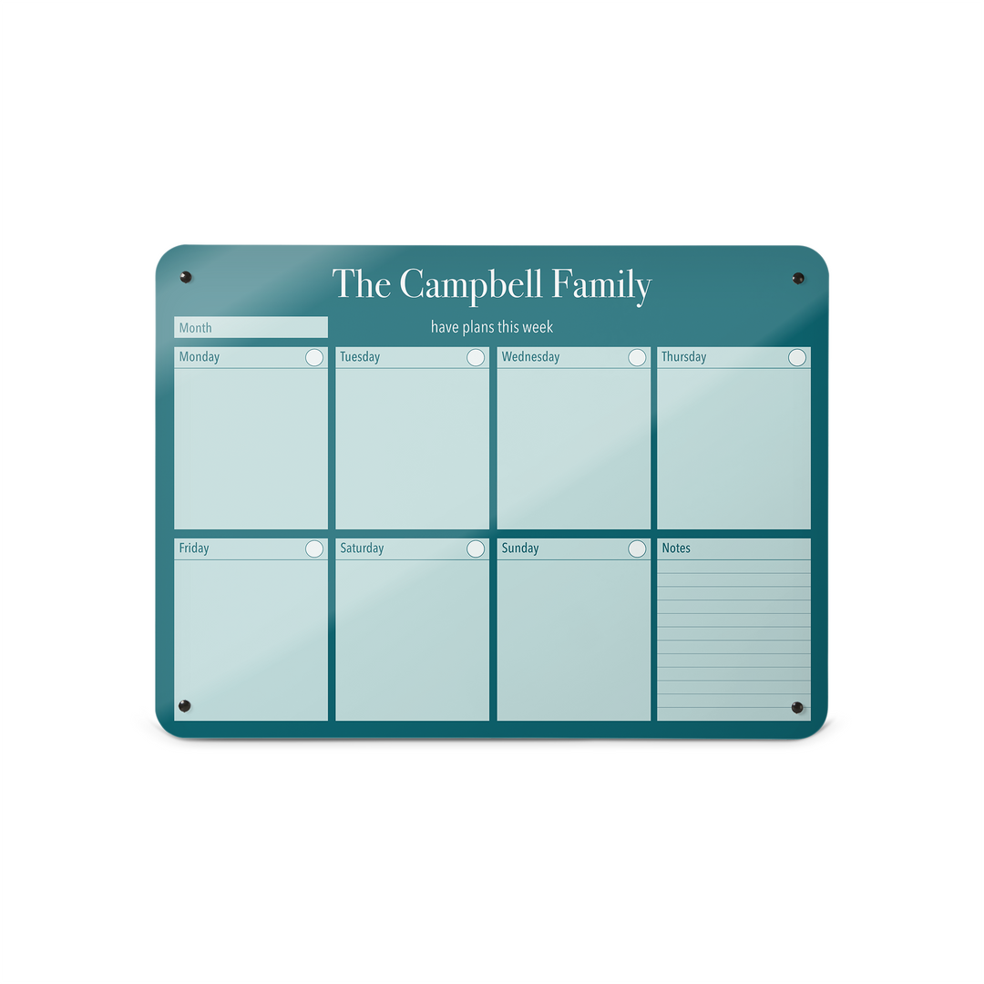 A medium magnetic notice board by Beyond the Fridge with a weekly planner design to personalise  in a teal colour and landscape format 