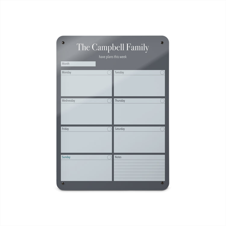 A medium magnetic notice board by Beyond the Fridge with a weekly planner design to personalise  in a grey colour and portrait format 
