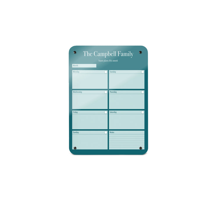 A small magnetic notice board by Beyond the Fridge with a weekly planner design to personalise  in a teal colour and portrait format 
