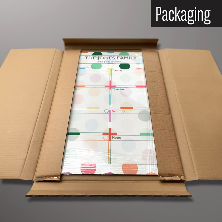 A spots design personalised dry wipe weekly planner magnetic board in it’s cardboard packaging