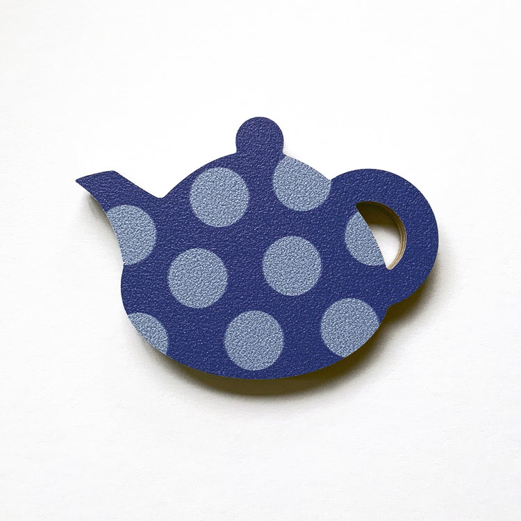 A blue spotty teapot shaped plywood fridge magnet by Beyond the Fridge