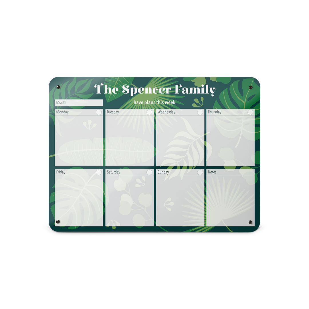 A medium landscape  format tropical leaves design weekly planner magnetic notice board by Beyond the Fridge personalised with a name 