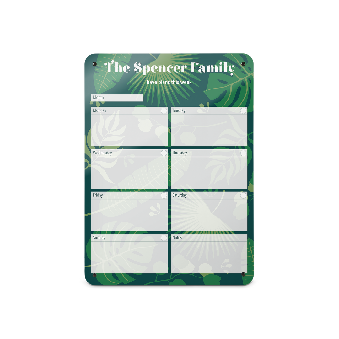 A medium portrait format tropical leaves design weekly planner magnetic notice board by Beyond the Fridge personalised with a name 