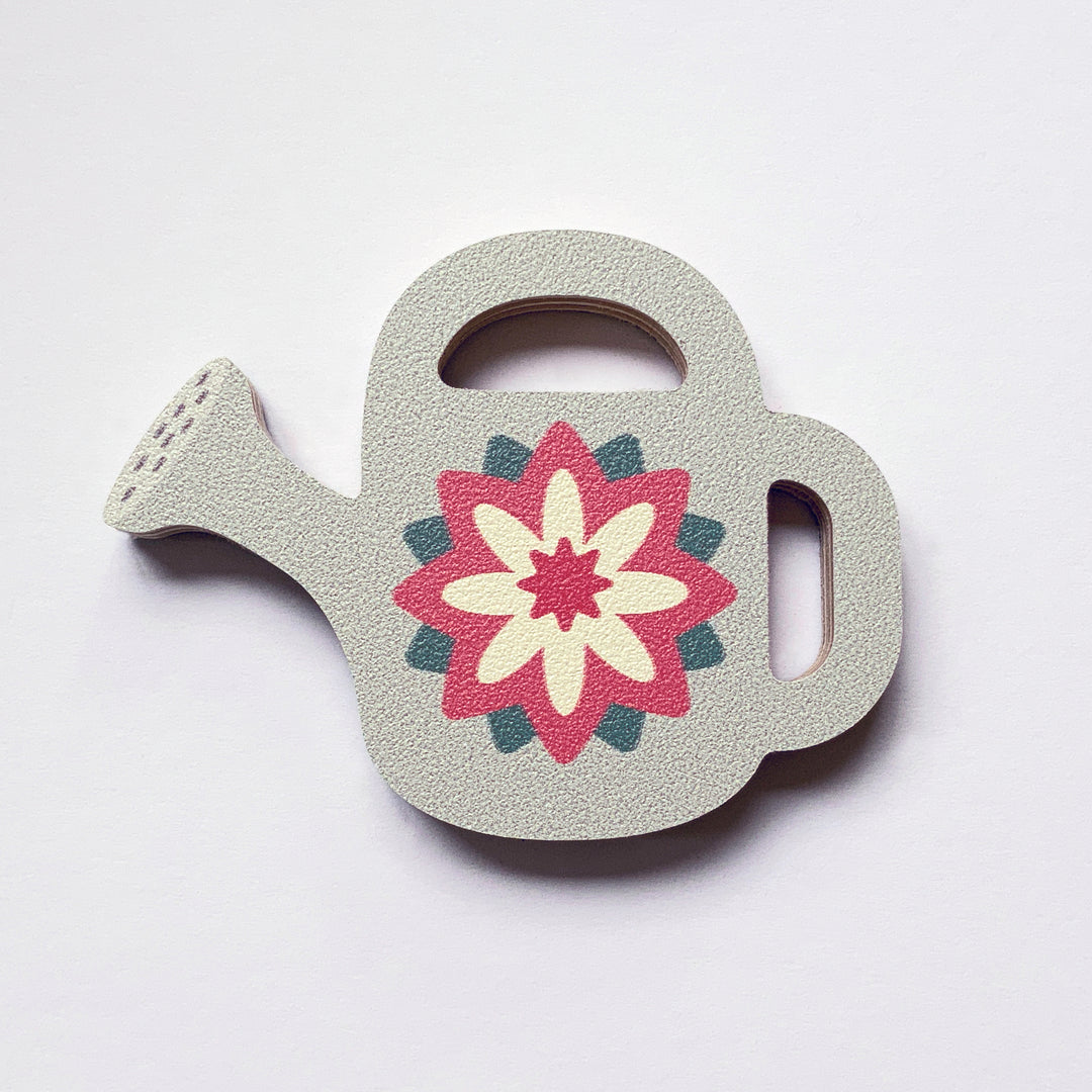 A watering can shaped plywood fridge magnet by Beyond the Fridge