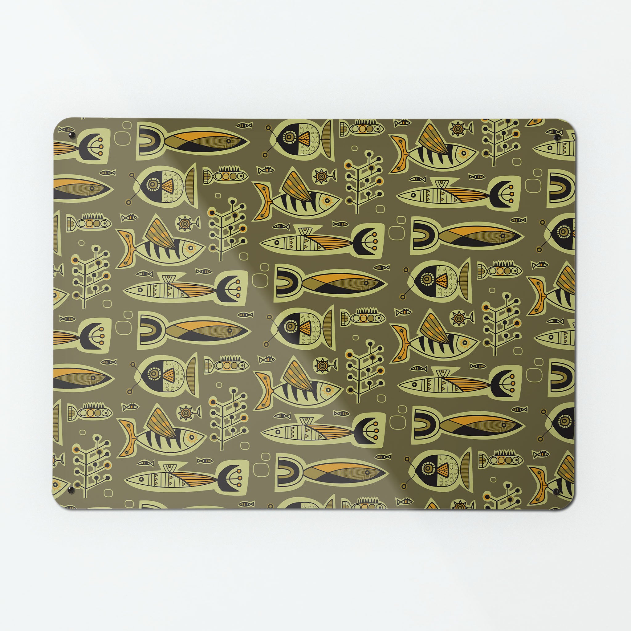 A large magnetic notice board by Beyond the Fridge with a retro style repeat pattern of aquarium fish in kelp colours