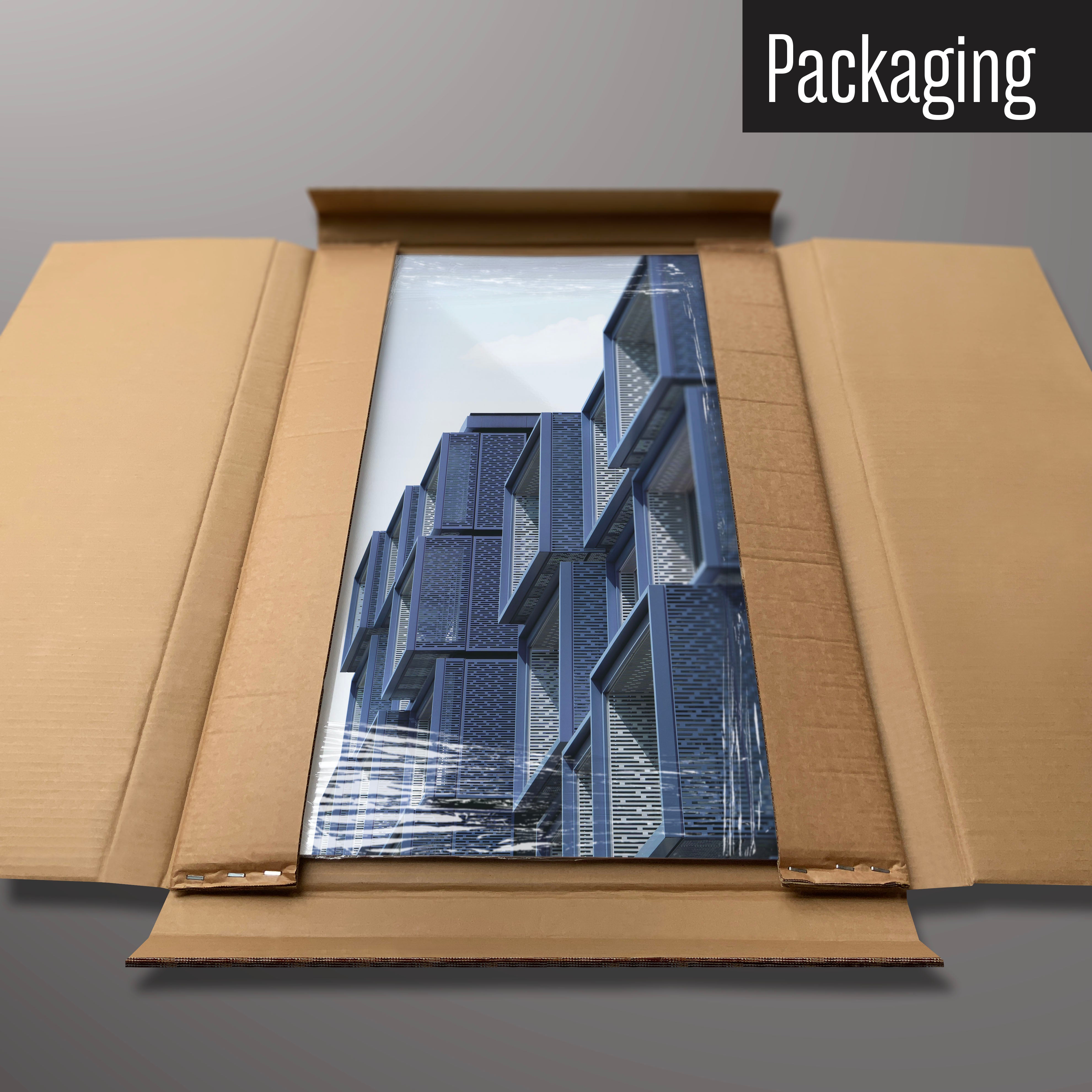 A blue building photographic magnetic board in it’s cardboard packaging