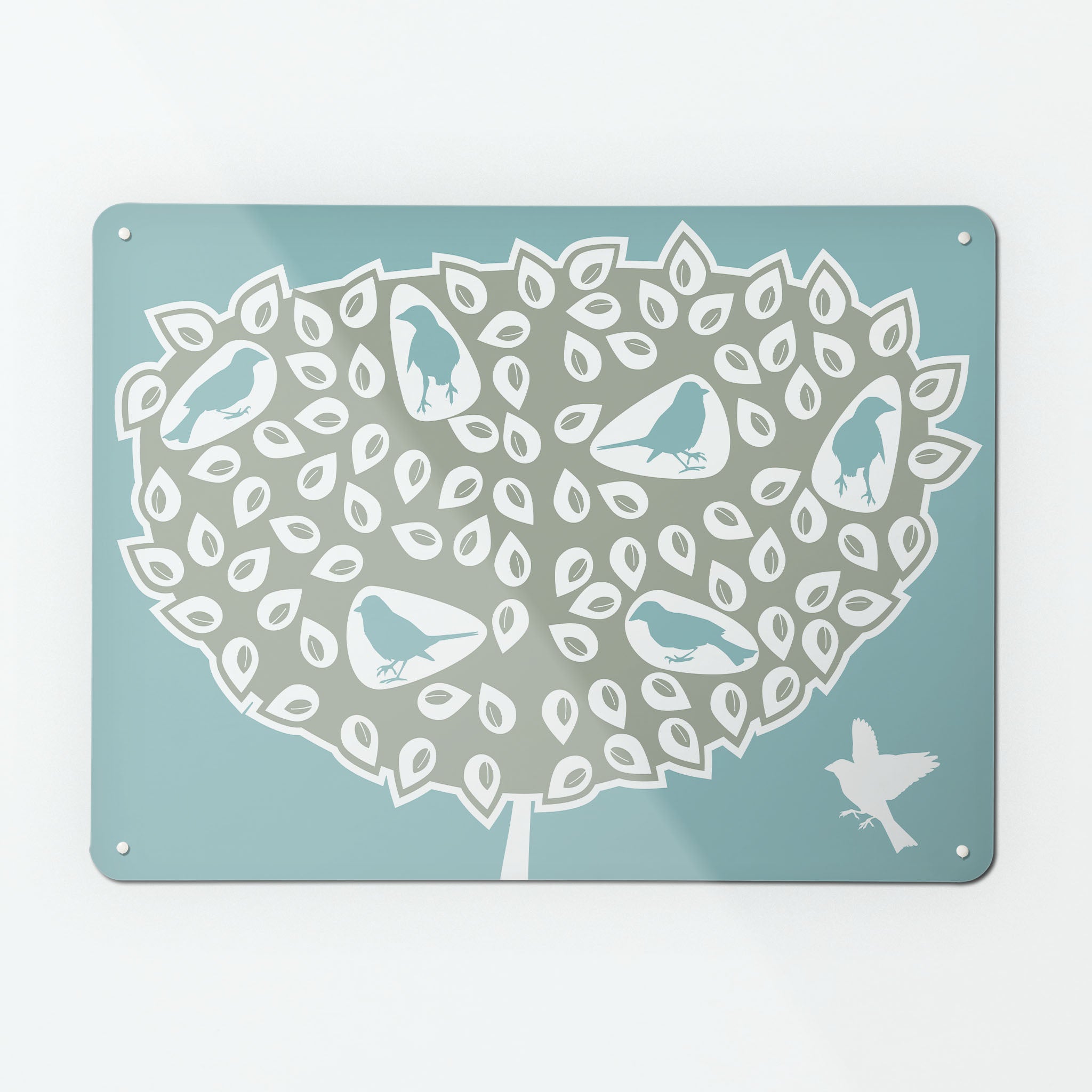 A large magnetic notice board by Beyond the Fridge with a blue birds in a tree design