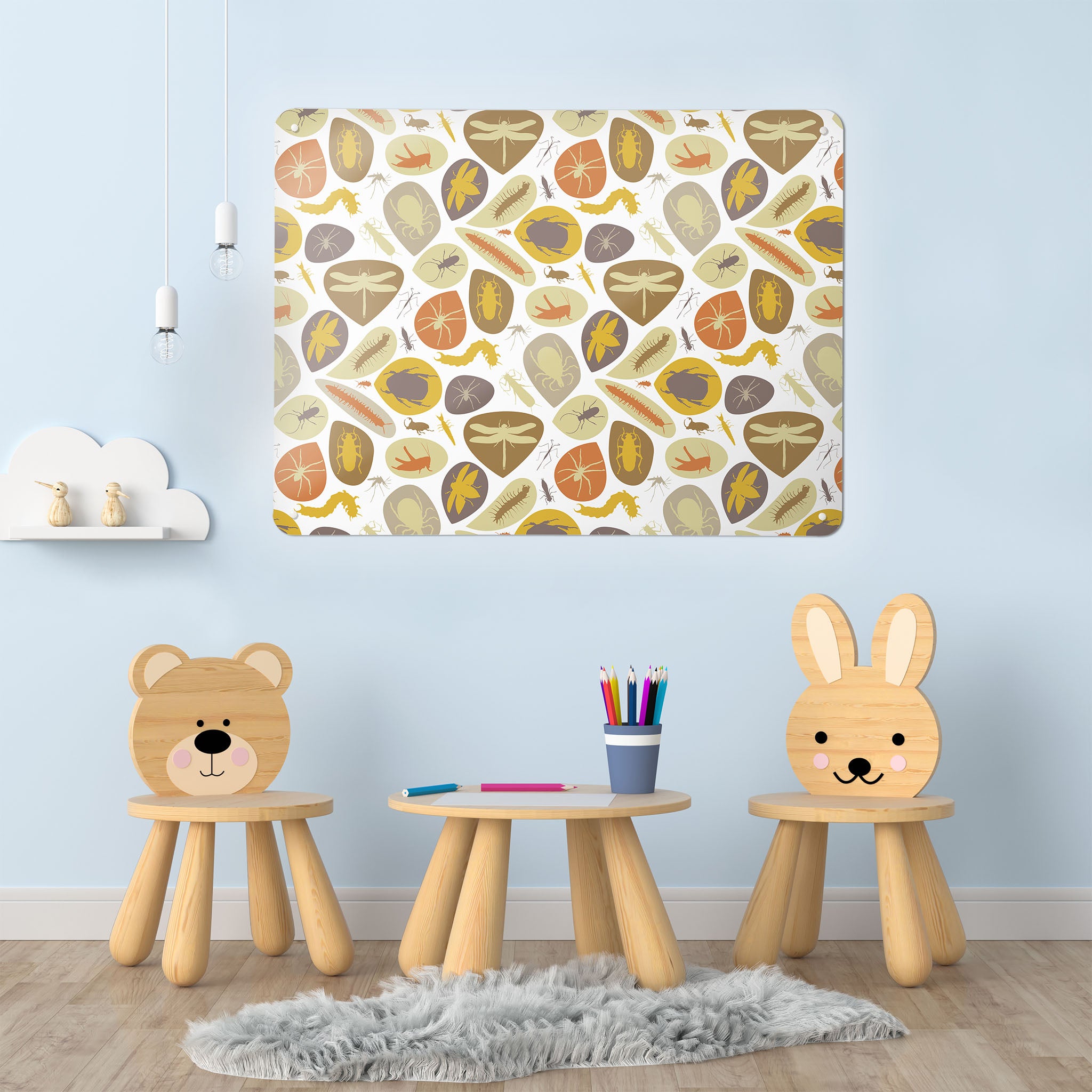 A playroom  interior with a magnetic metal wall art panel showing a bugs design in earthy colours