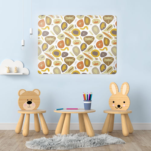 A playroom  interior with a magnetic metal wall art panel showing a bugs design in earthy colours