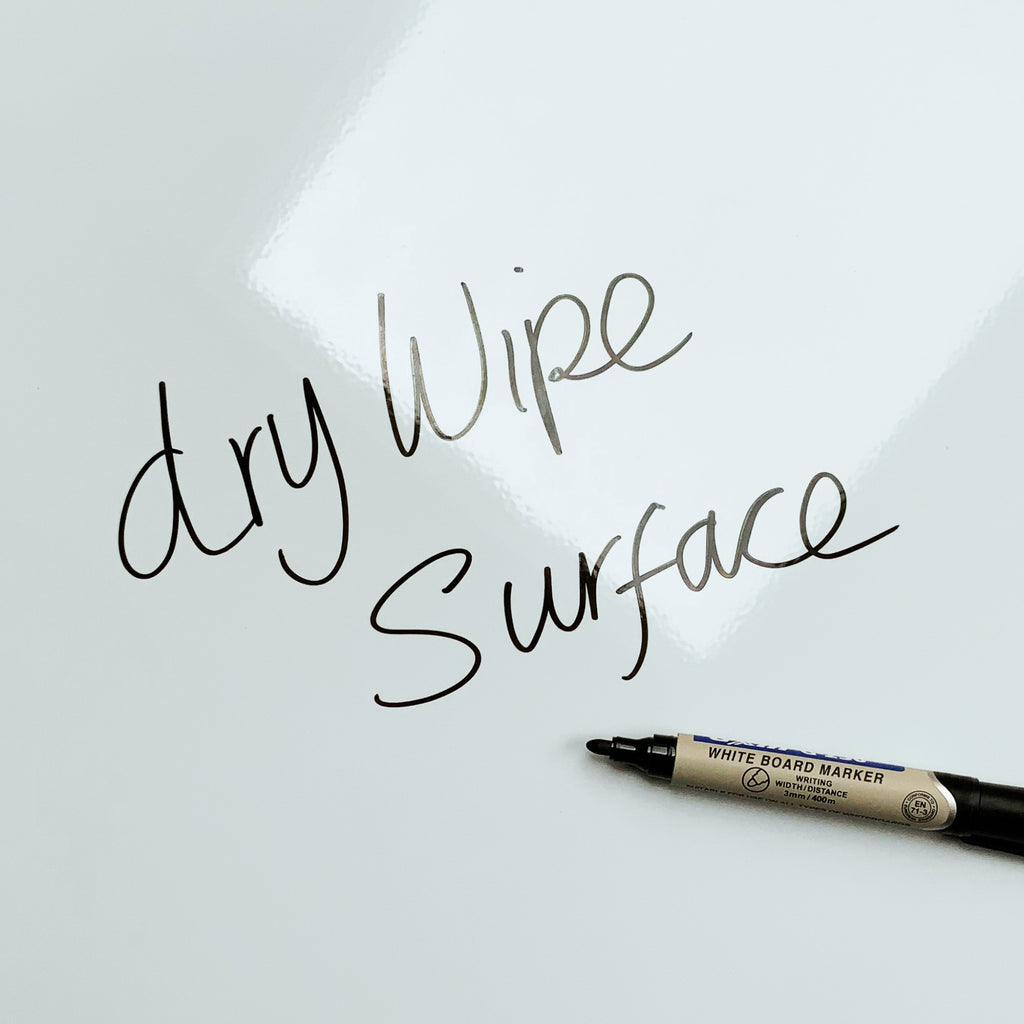 The words dry wipe surface written in marker pen on the Bunting magnetic notice board