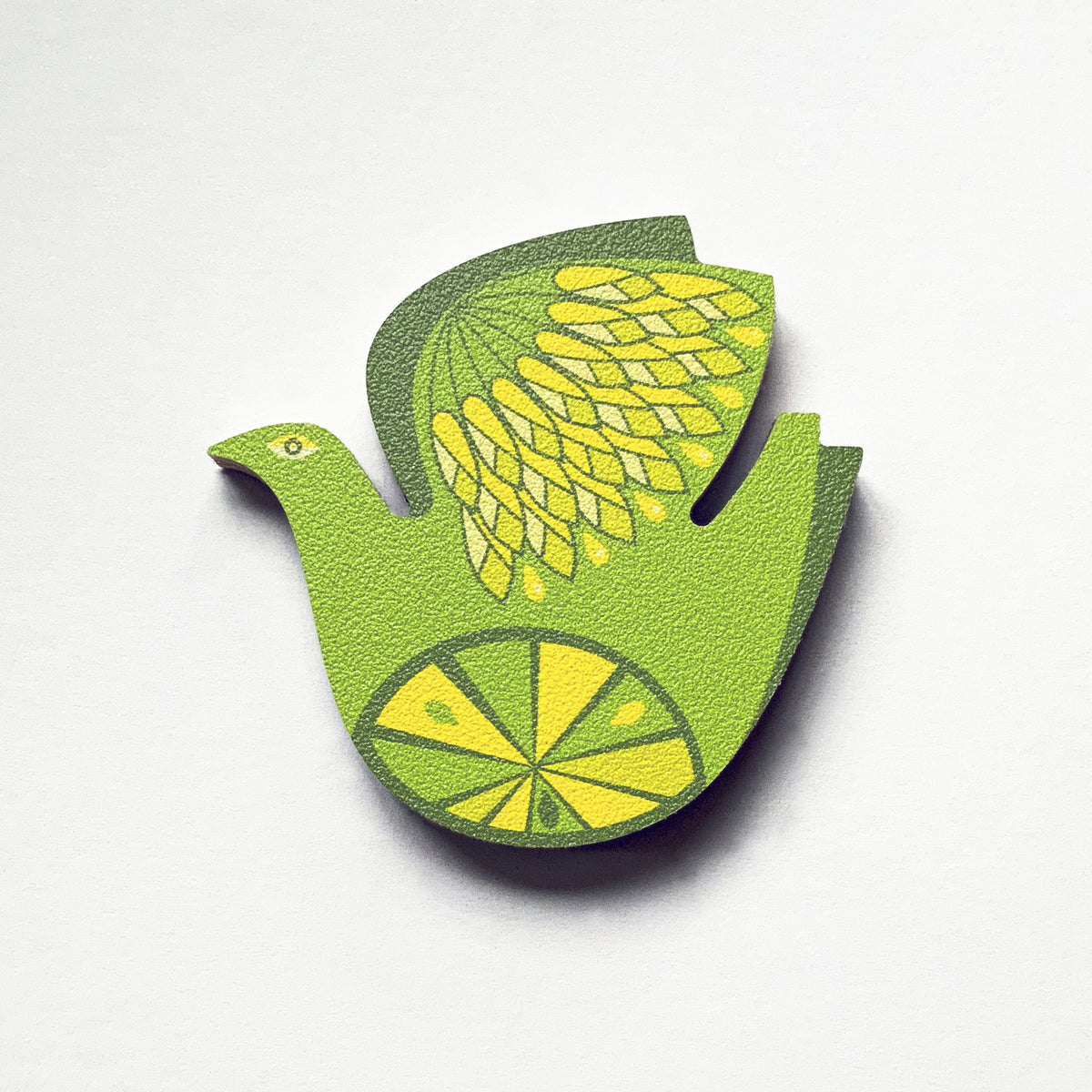 A retro citrus bird lemon and lime design plywood fridge magnet by Beyond the Fridge