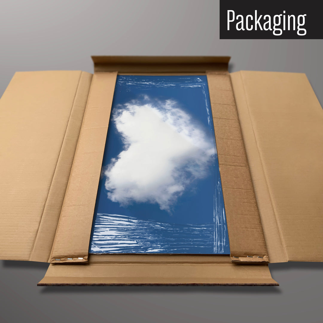A cloud heart magnetic board in it’s cardboard packaging