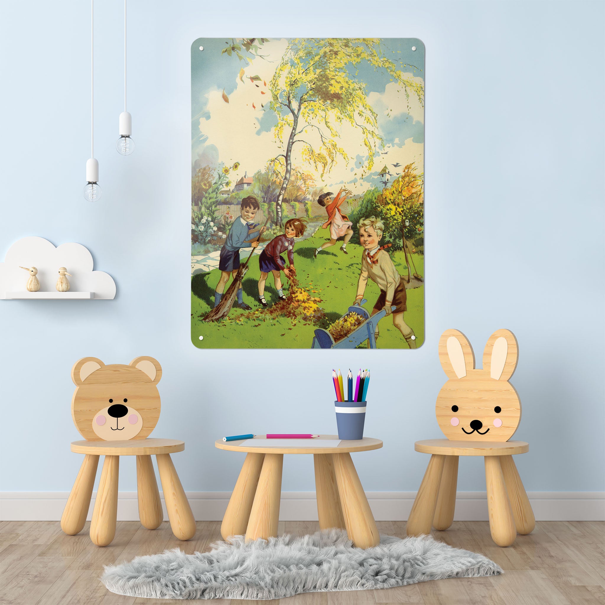 A playroom interior with a magnetic metal wall art panel showing an  illustration of children collecting leaves