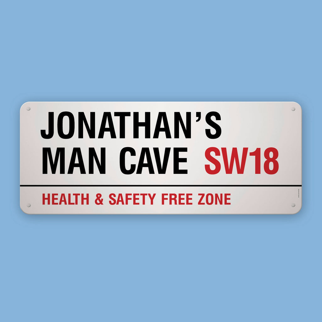 A personalised 100 cm London street sign reading Jonathan’s Man Cave SW18, Health & Safety Free Zone