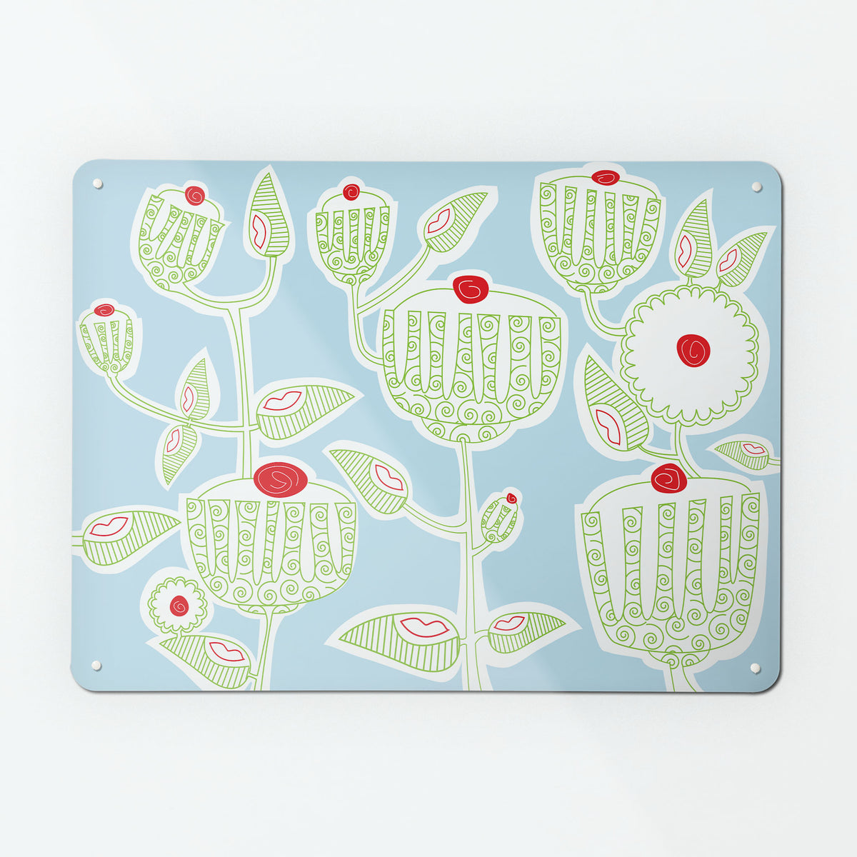  A large magnetic notice board by Beyond the Fridge with a cupcake plant design in green, red, white and blue