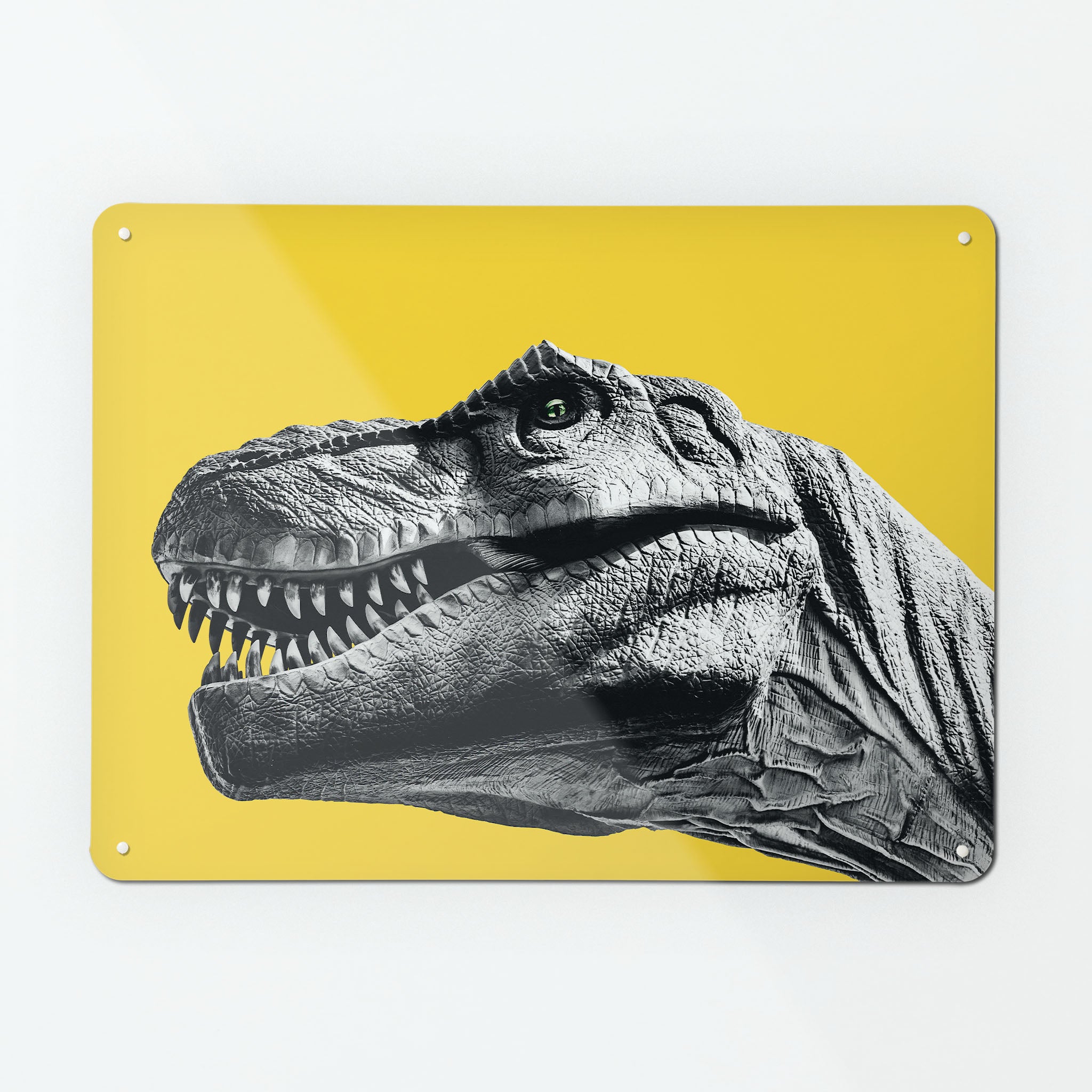 A large magnetic notice board by Beyond the Fridge with an image of a black and white tyrannosaurus rex dinosaur on a yellow background