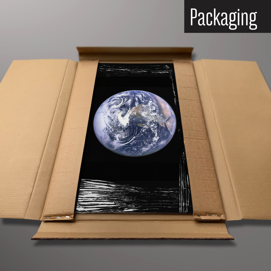 An Earth from Space photographic magnetic board in it’s cardboard packaging