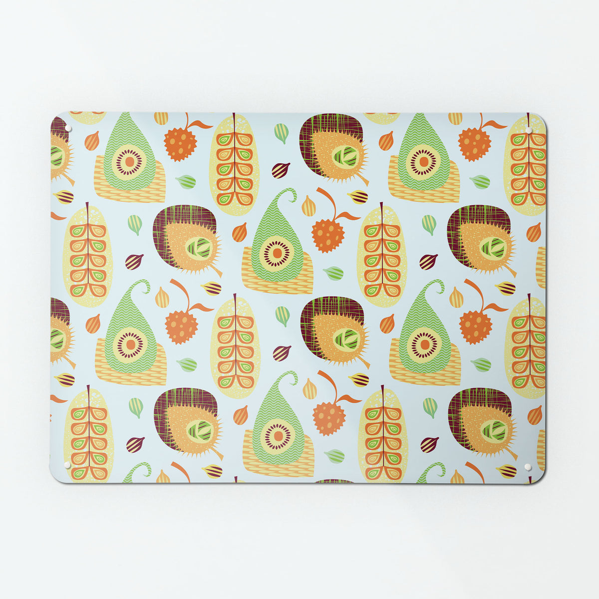 A large magnetic notice board by Beyond the Fridge with an exotic fruit repeat pattern design in pastel colours