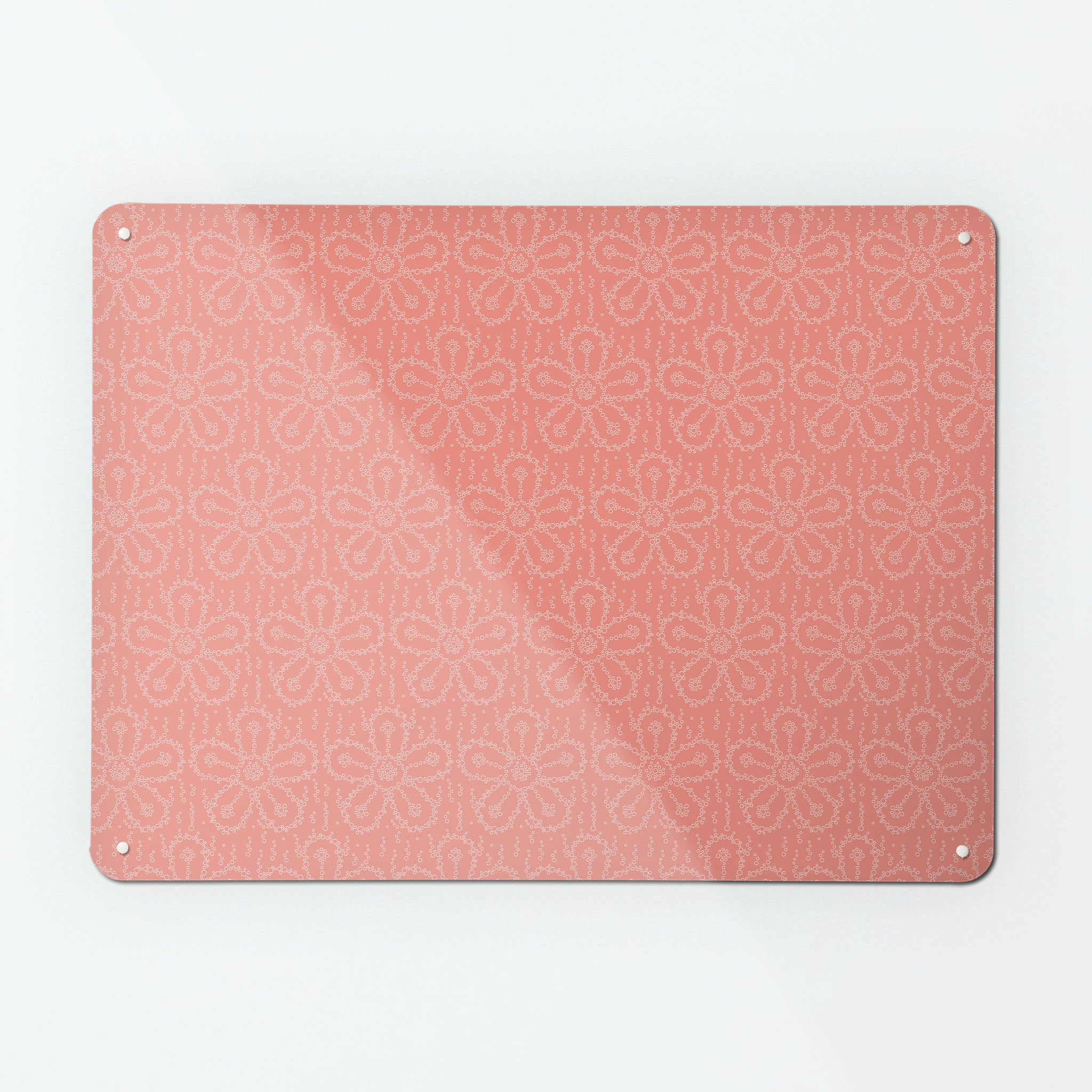 A large magnetic notice board by Beyond the Fridge with a fizzy flower pattern in pink fizz colour