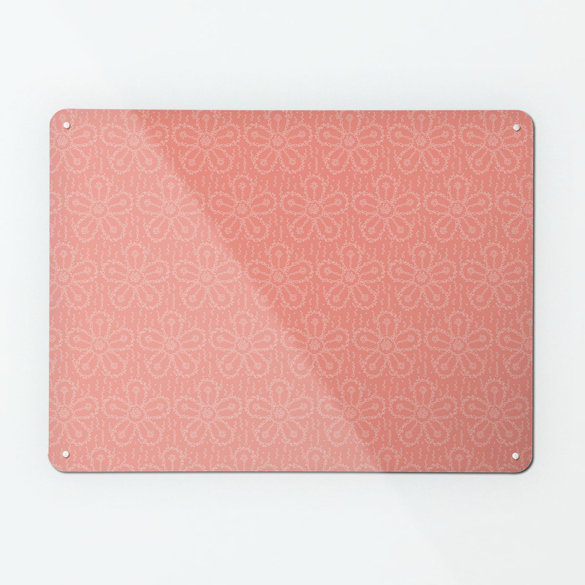 A large magnetic notice board by Beyond the Fridge with a fizzy flower pattern in pink fizz colour