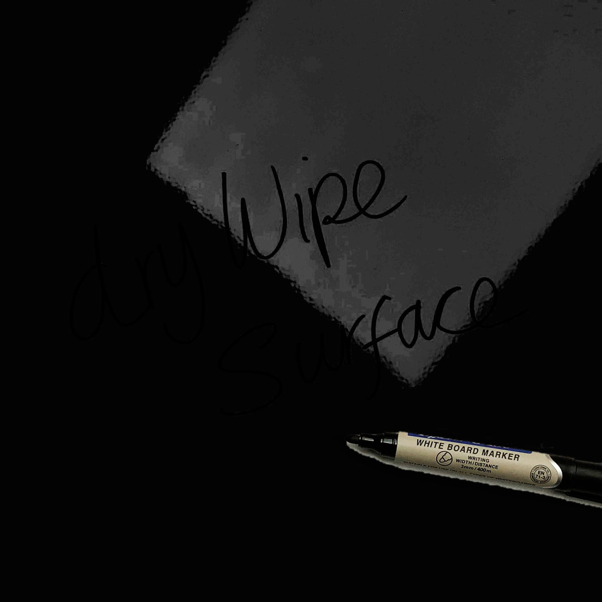 The words dry wipe surface written in marker pen on the Friesian Cow magnetic notice board