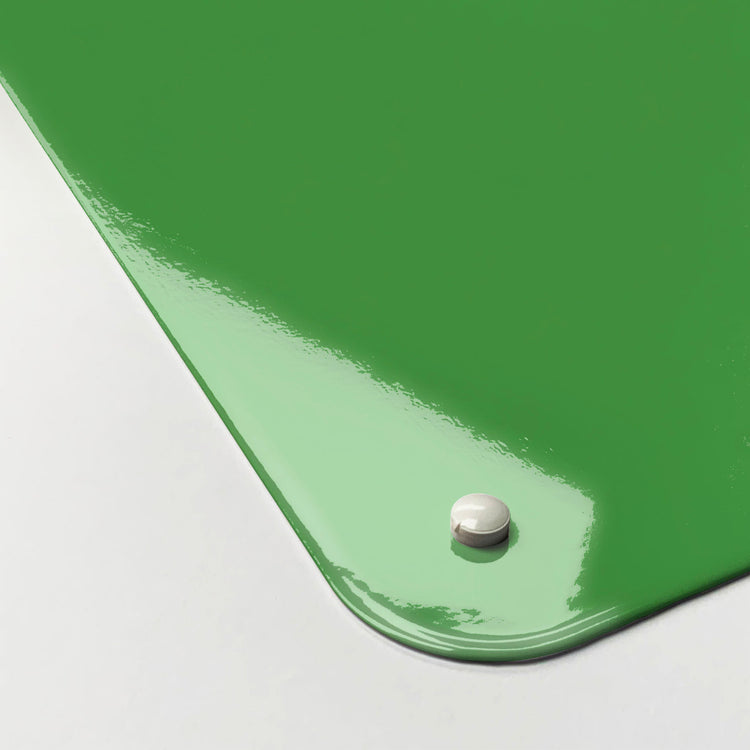 The corner detail of a green gingham cockerel design magnetic board to show it’s high gloss surface