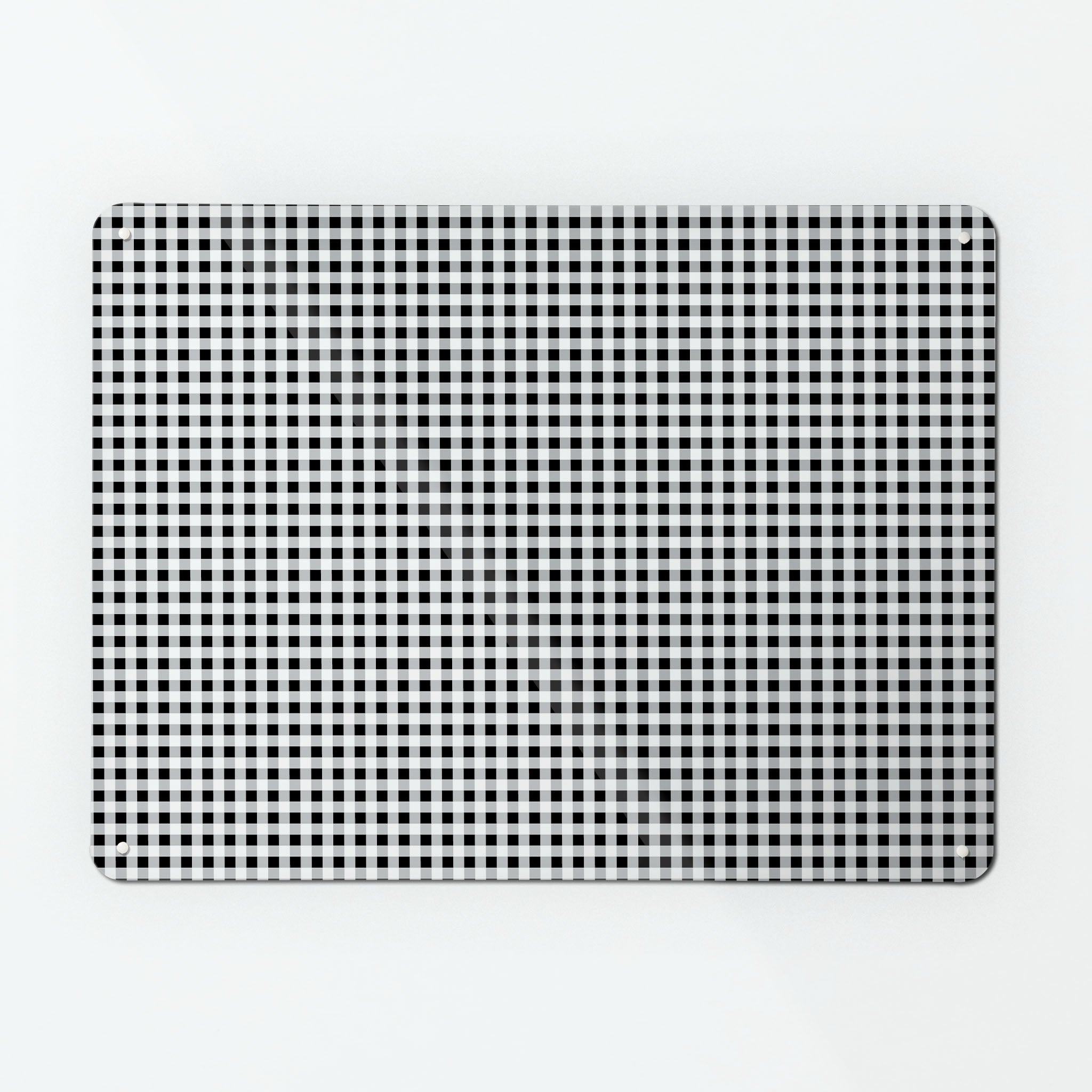 A large magnetic notice board by Beyond the Fridge with a black and white gingham pattern