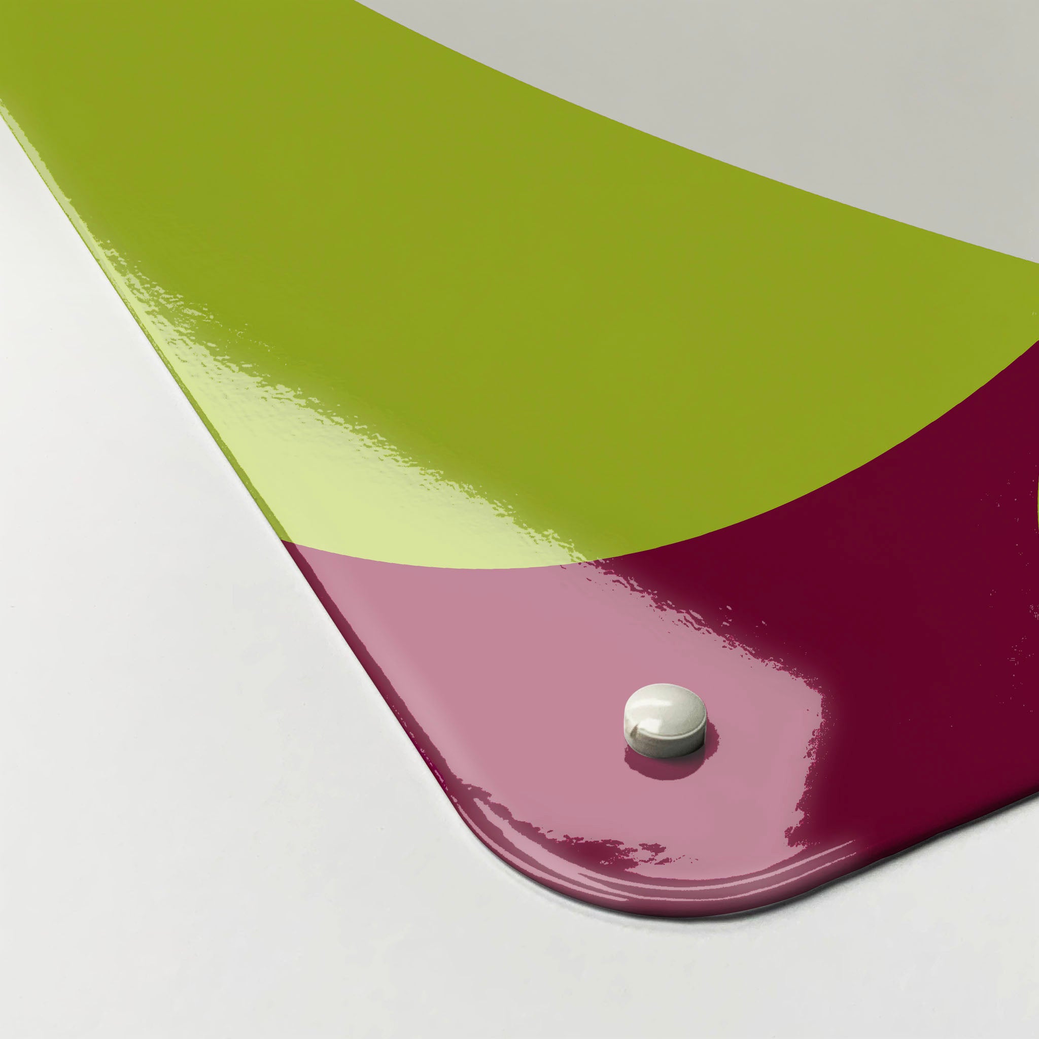 The corner detail of a green apples design magnetic board to show it’s high gloss surface