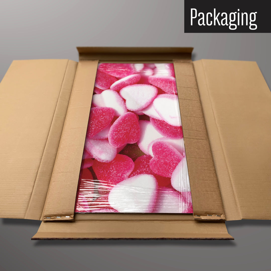 A heart sweets magnetic board in it’s cardboard packaging