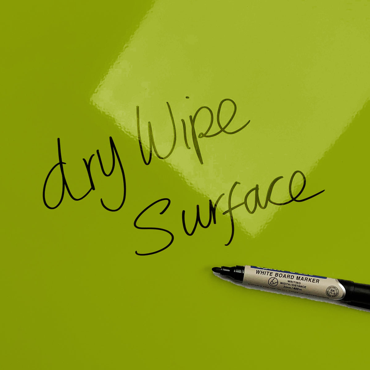 The words dry wipe surface written in marker pen on the Kiwi magnetic notice board