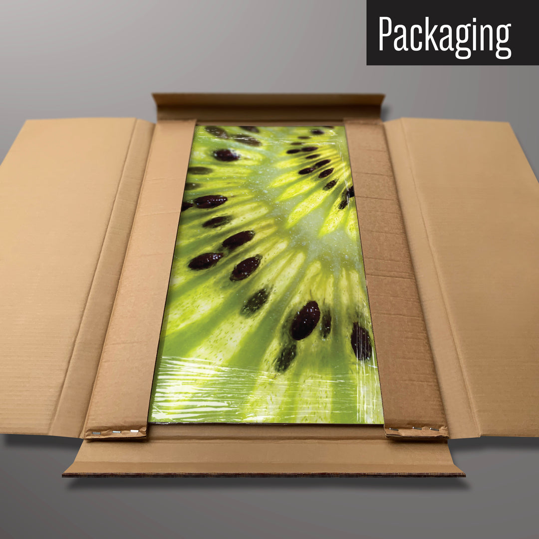 A kiwi fruit magnetic board in it’s cardboard packaging