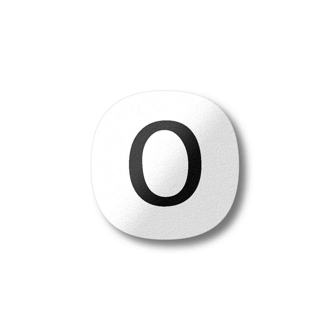 A white magnet with a black letter O plywood fridge magnet by Beyond the Fridge