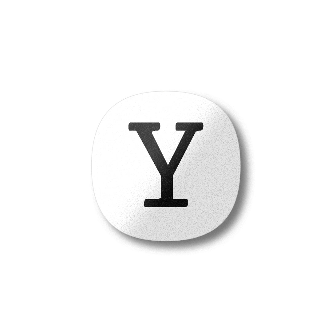 A white magnet with a black letter Y plywood fridge magnet by Beyond the Fridge