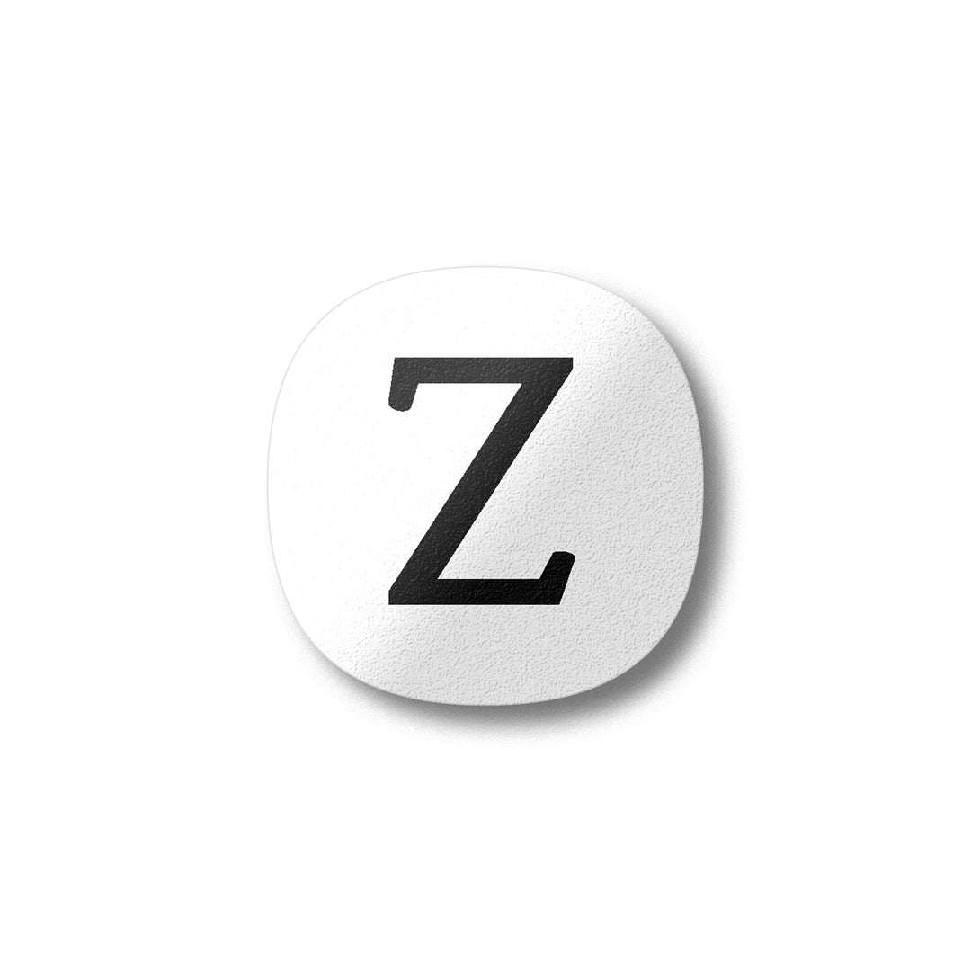 A white magnet with a black letter Z plywood fridge magnet by Beyond the Fridge