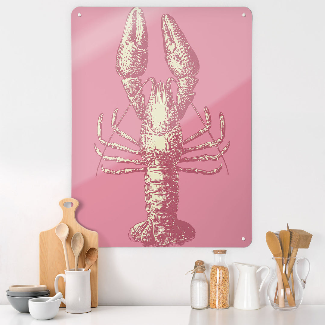 A kitchen  interior with a magnetic metal wall art panel showing a lobster illustration in pink