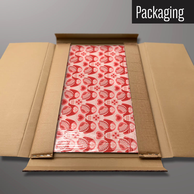 A retro lovebird design magnetic board in it’s cardboard packaging