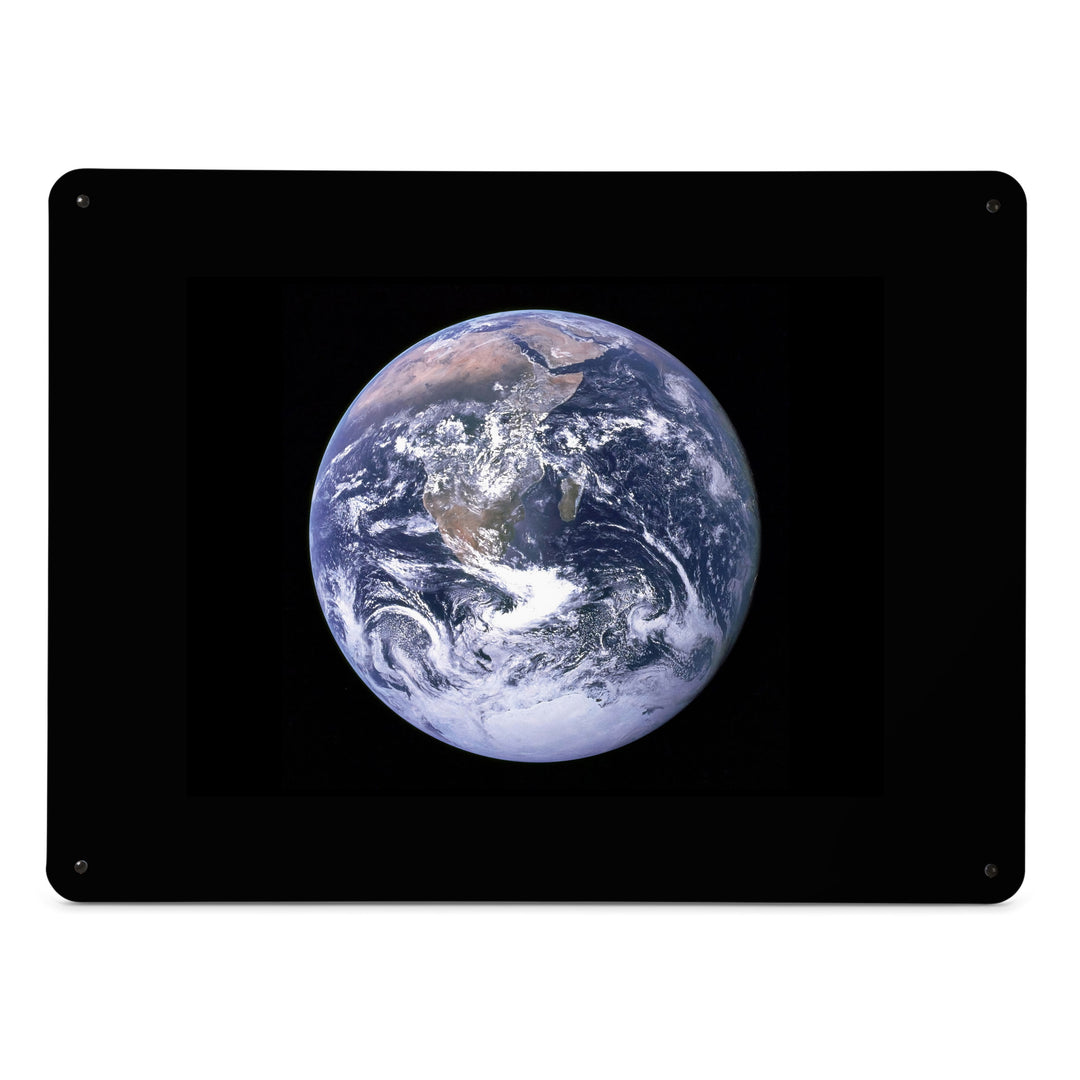 A large magnetic notice board by Beyond the Fridge with a photograph of planet Earth shot from outer space