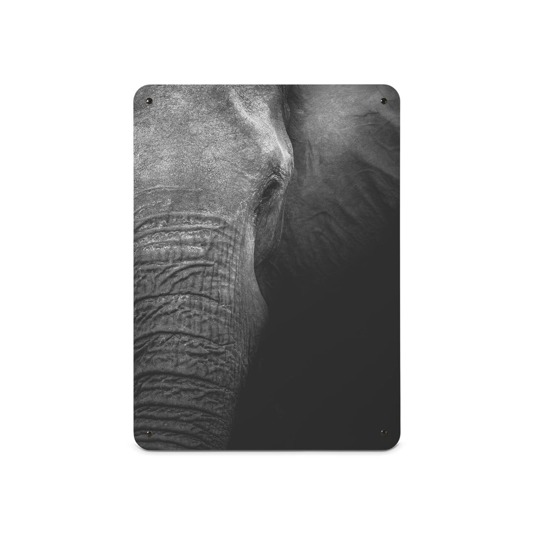 A medium magnetic notice board by Beyond the Fridge with a black and white close up photograph of the face of an elephant