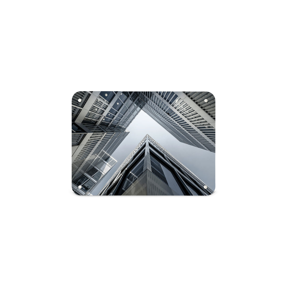 A small magnetic notice board by Beyond the Fridge with a dramatic photographic image of Zürich Skyscrapers