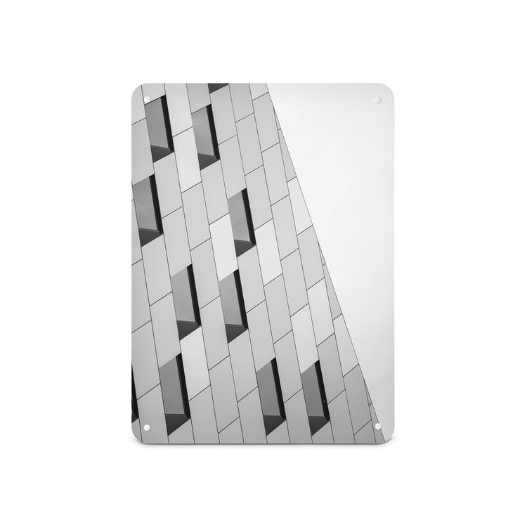 A medium magnetic notice board by Beyond the Fridge with an image of an abstract building and windows in black and white 