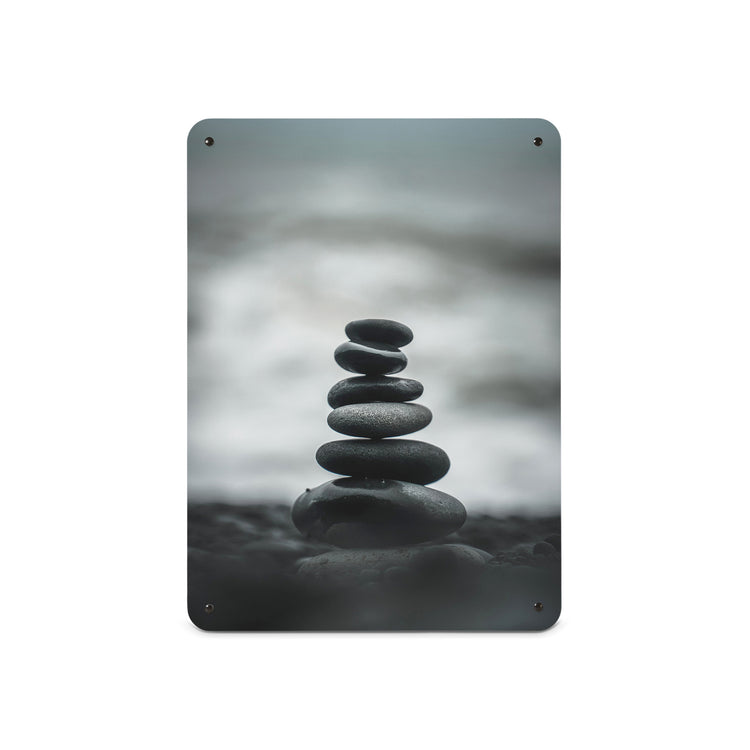 A medium magnetic notice board by Beyond the Fridge with a monochrome photograph of balancing stones on a beach