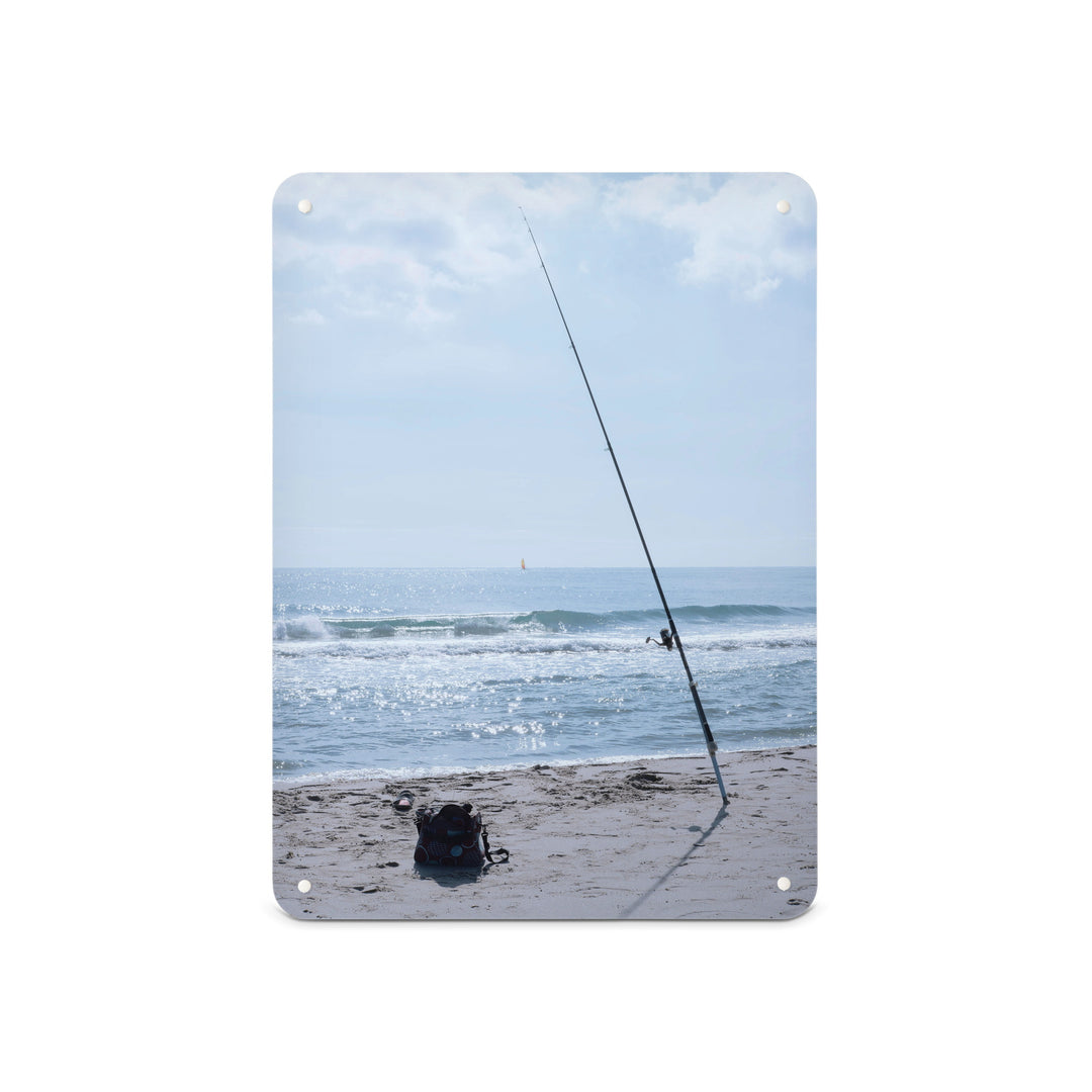 A medium magnetic notice board by Beyond the Fridge with a photograph of fishing tackle on a sunny beach
